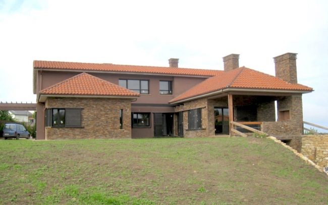 Entrada principal de chale de nueva planta Gijon