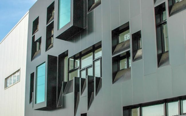 Reforma nave industrial Gijón Aluminios Pérez Soto Dolmen Arquitectos