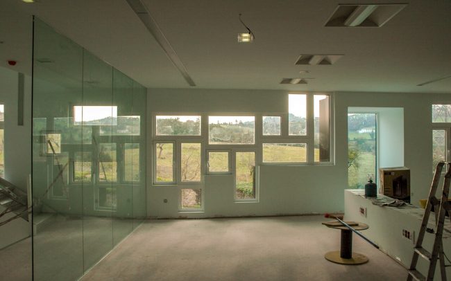 Reforma nave industrial Gijón Aluminios Pérez Soto Dolmen Arquitectos