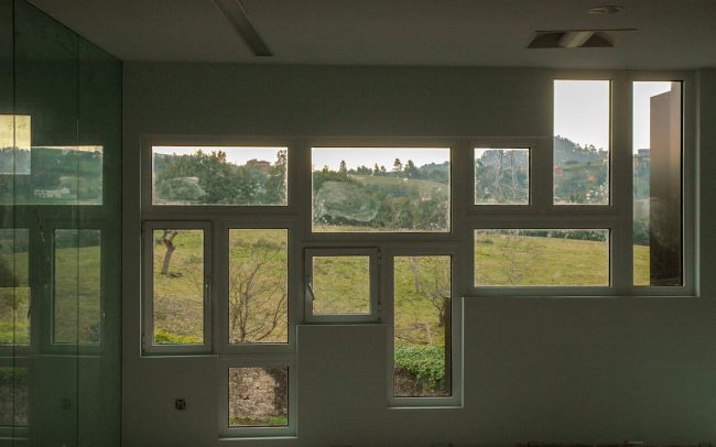 Reforma nave industrial Gijón Aluminios Pérez Soto Dolmen Arquitectos