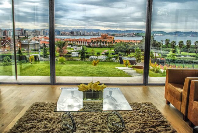 Vivienda de lujo en El Rinconín Gijón diseño de Dolmen Arquitectos arquitectura e interiorismo en Asturias