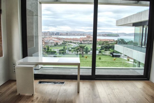 Vivienda de lujo en El Rinconín Gijón diseño de Dolmen Arquitectos arquitectura e interiorismo en Asturias