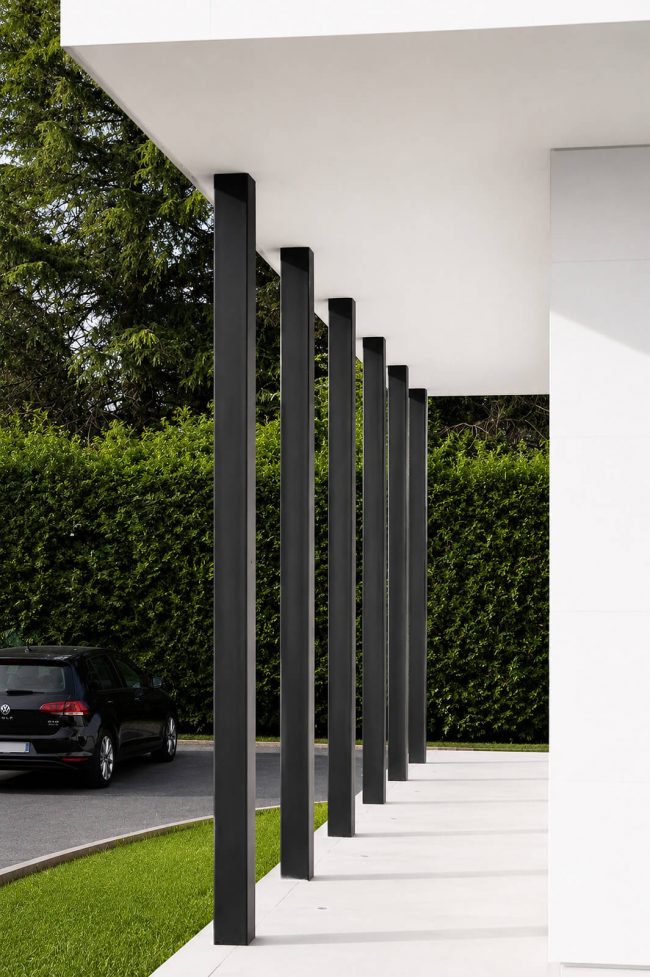 porche entrada cubierto vivienda unifamiliar camino Jazmines Gijón byDolmen