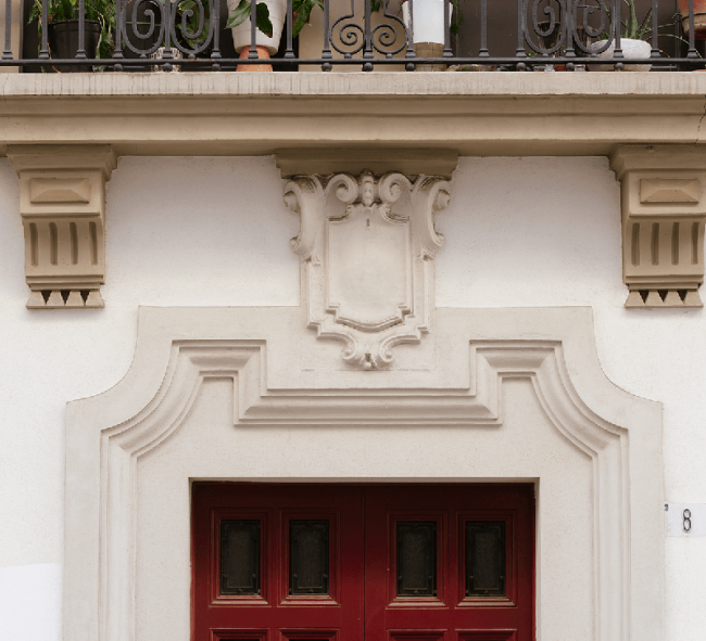 Reforma de portal y fachada de edificio catalogado en Gijón. Dolmen Arquitectos