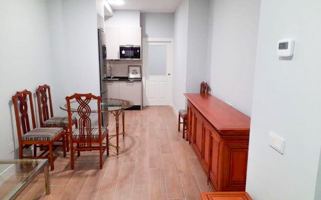 salon local transformado vivienda Oviedo_ byDolmen